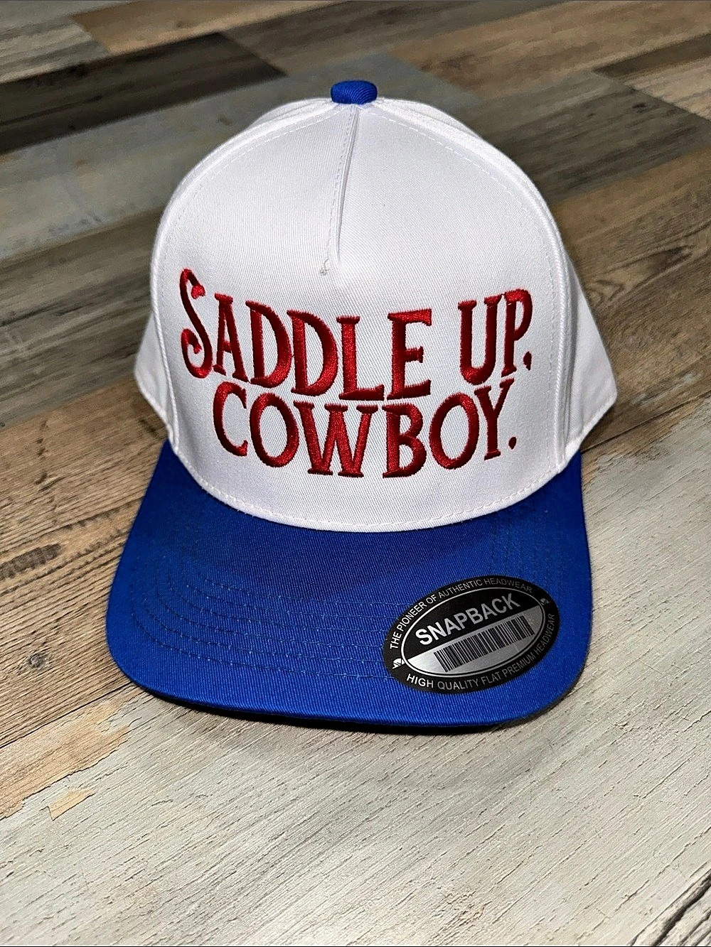 Saddle Up Cowboy Trucker Hat in White & Blue